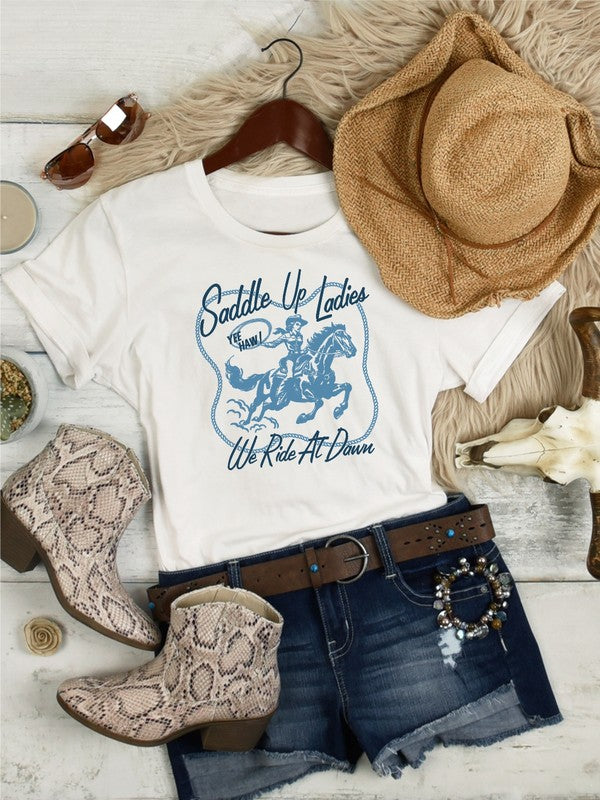 Saddle Up Ladies We Ride At Dawn Graphic Tee - lolaluxeshop