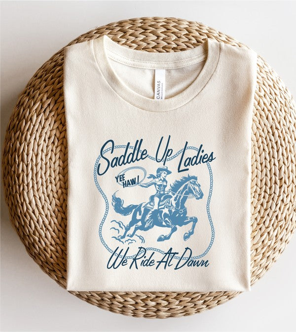 Saddle Up Ladies We Ride At Dawn Graphic Tee - lolaluxeshop