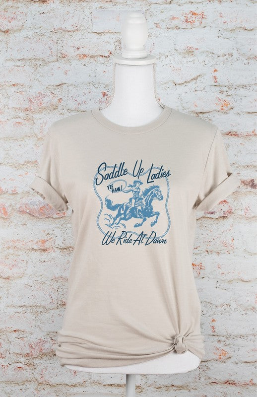 Saddle Up Ladies We Ride At Dawn Graphic Tee - lolaluxeshop